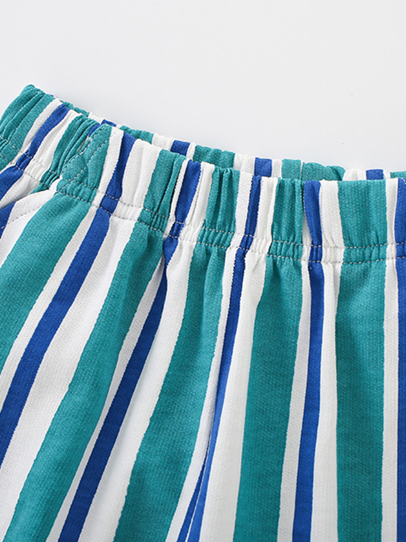 Boys' cotton underwear with elastic waistband and blue, green, and white stripes.