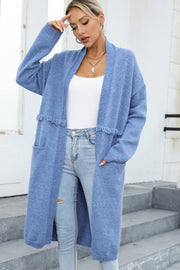 Light blue longline knit cardigan with fringe trim and pockets, open front, relaxed fit
