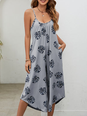 Monstera print culotte jumpsuit in Gray Dawn with gathered bust and pockets.