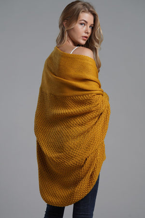 Mustard knit cardigan with batwing sleeves and drape front detail.