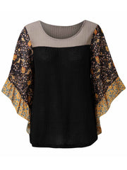 Black textured panel blouse with floral flutter sleeves and grey yoke.