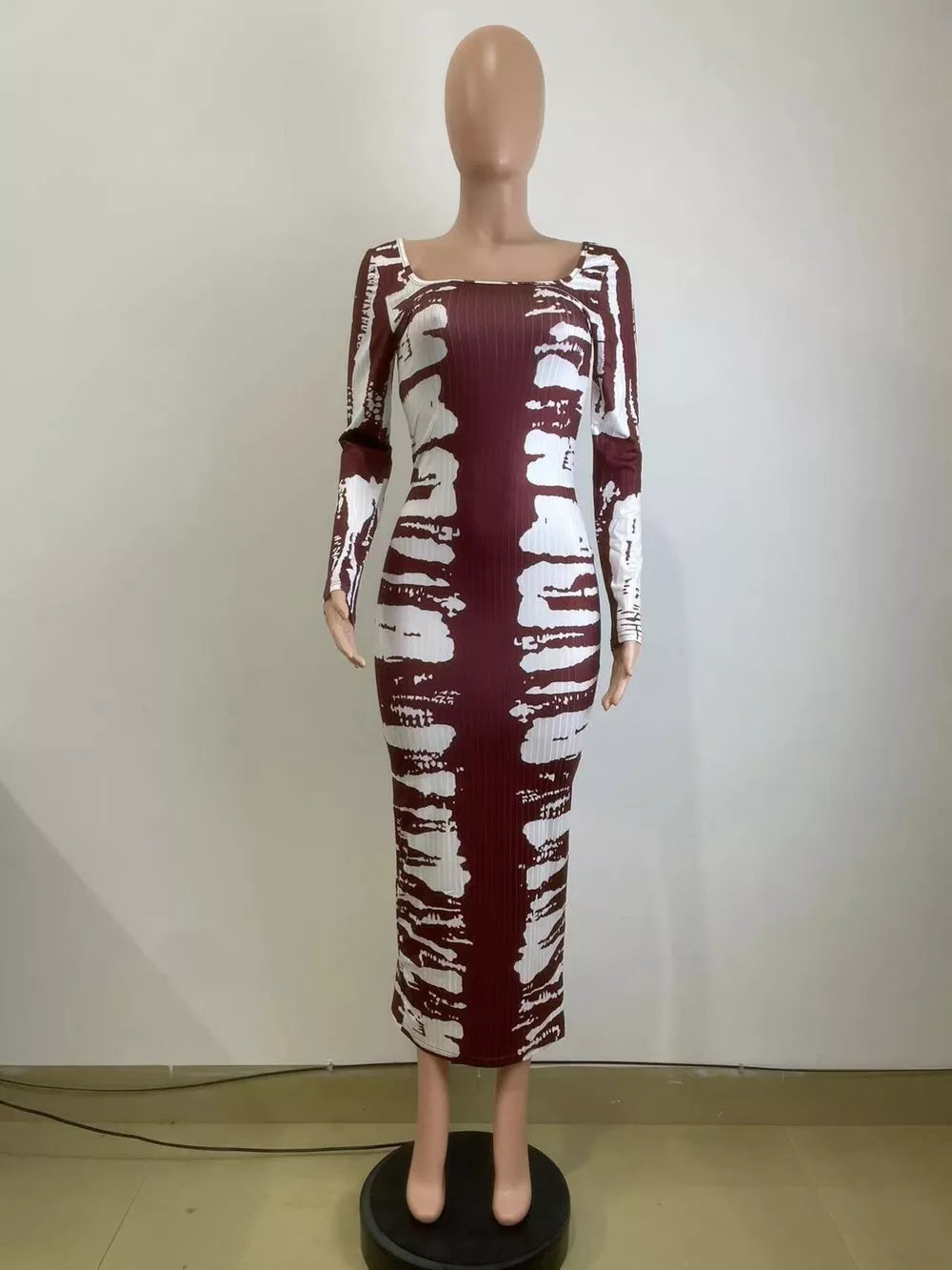 Wine red tie-dye maxi dress with long sleeves and square neckline.