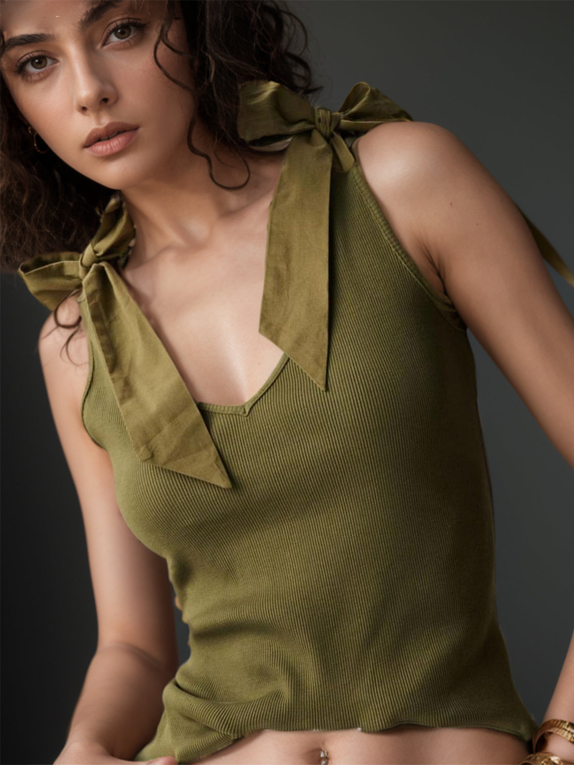 Ribbed knit tank top in Army Green with bow shoulder straps and V-neck.