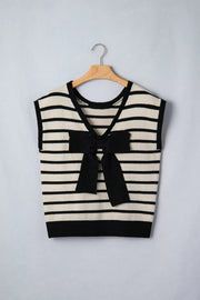 Black and cream striped knit vest with a black bow detail