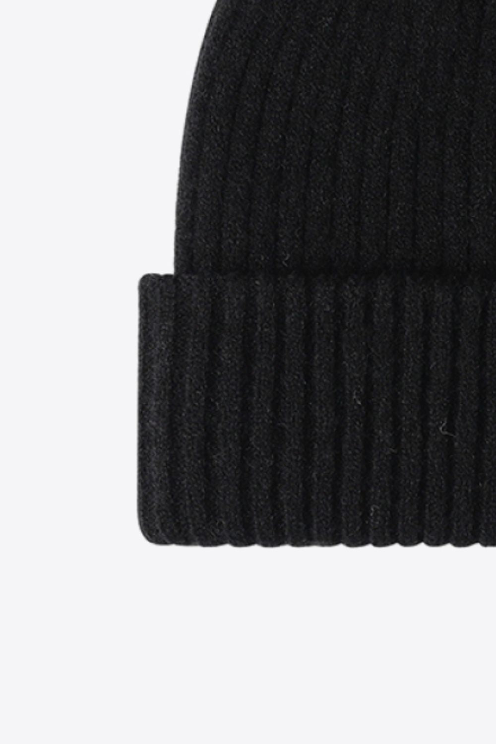 Black ribbed acrylic beanie with a cuffed hem