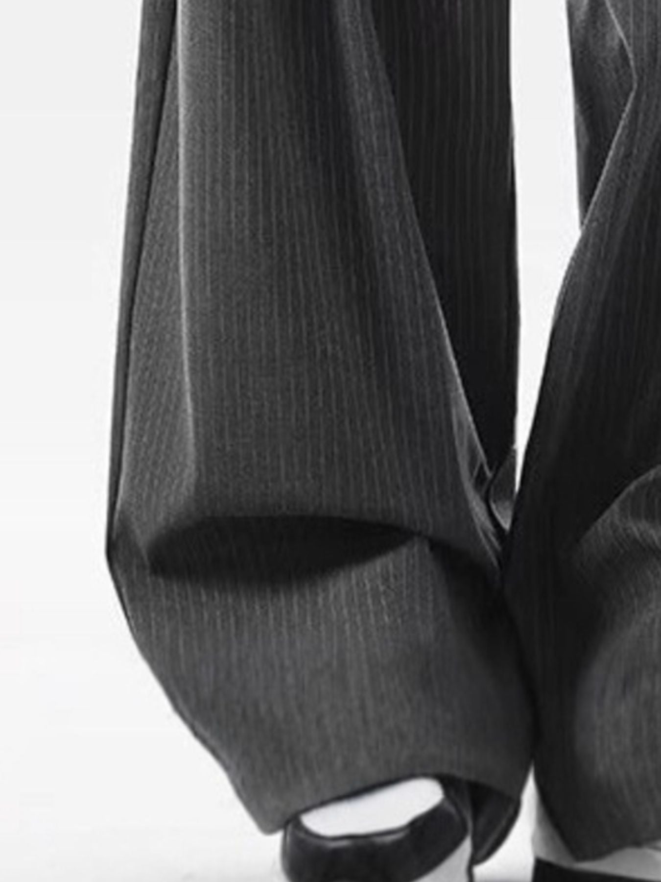Men's dark grey pinstriped wide leg sweatpants with a relaxed fit.