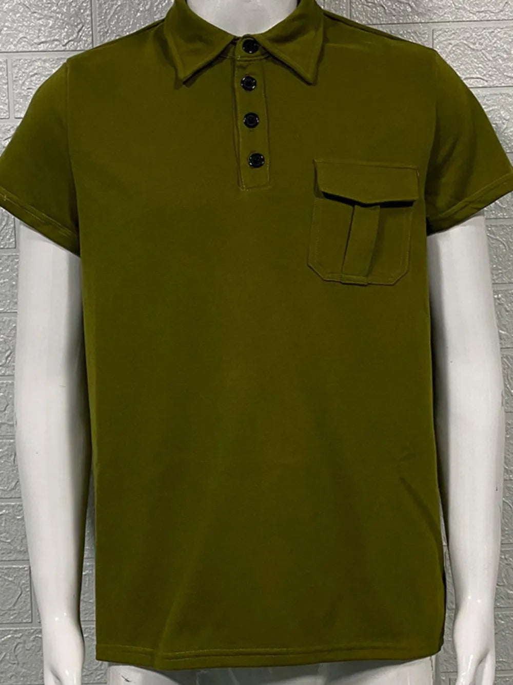 Army green acrylic short sleeve polo shirt with utility chest pocket and black buttons.