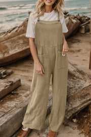Textured cotton overalls in camel with square pockets and adjustable straps.