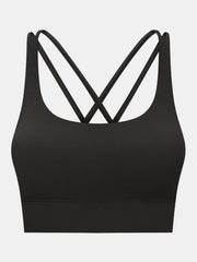 Black performance bra with crisscross back straps and scoop neckline.