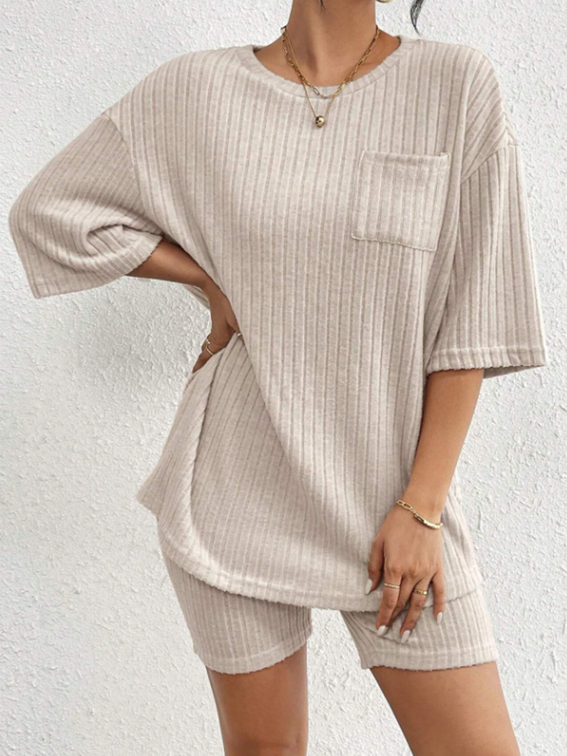 Relaxed ribbed lounge set in Dust Storm, featuring a short-sleeve top with chest pocket and matching shorts.