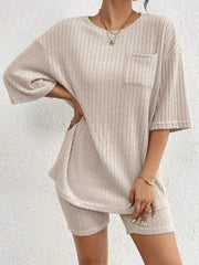 Relaxed ribbed lounge set in Dust Storm, featuring a short-sleeve top with chest pocket and matching shorts.