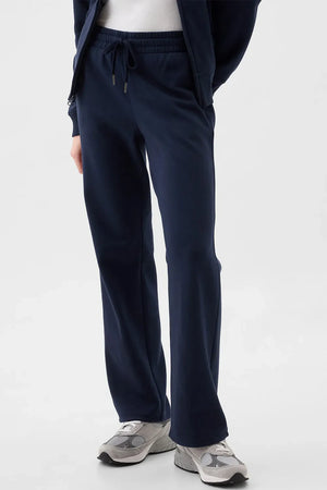 Navy relaxed-fit lounge trousers with drawstring waist and pockets.
