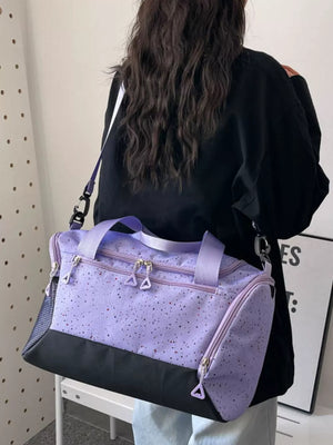 Chic speckled lavender travel bag with black contrast base and mesh side pockets.