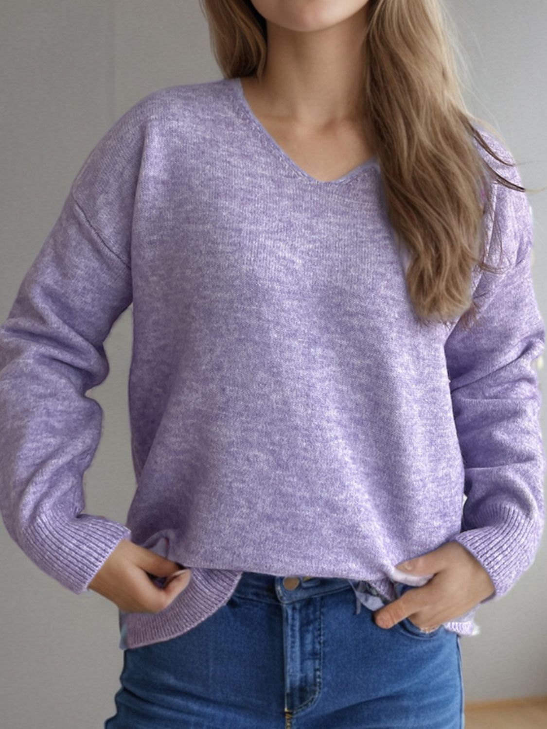 Relaxed-fit V-neck knit sweater in Pink Purple with ribbed hem and cuffs.