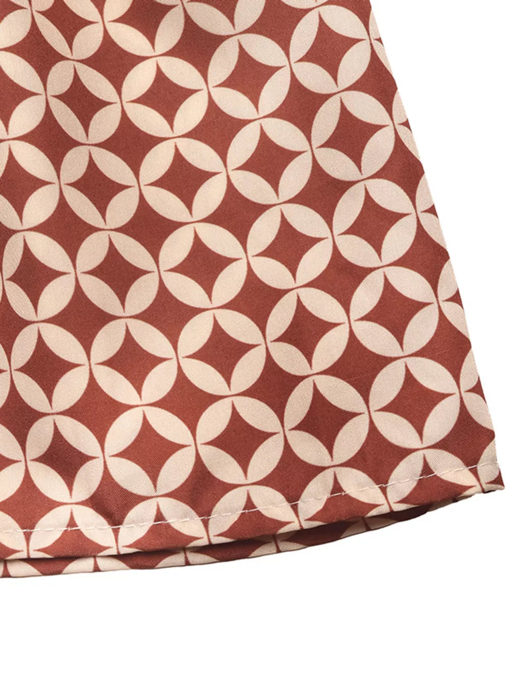 Cream and rust geometric print maxi skirt with elastane.