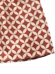 Cream and rust geometric print maxi skirt with elastane.