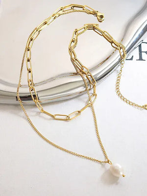 Gold layered necklace with paperclip chain and pearl pendant