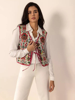 Embroidered tie-front cropped vest coat in deep red with floral pattern and pink trim.