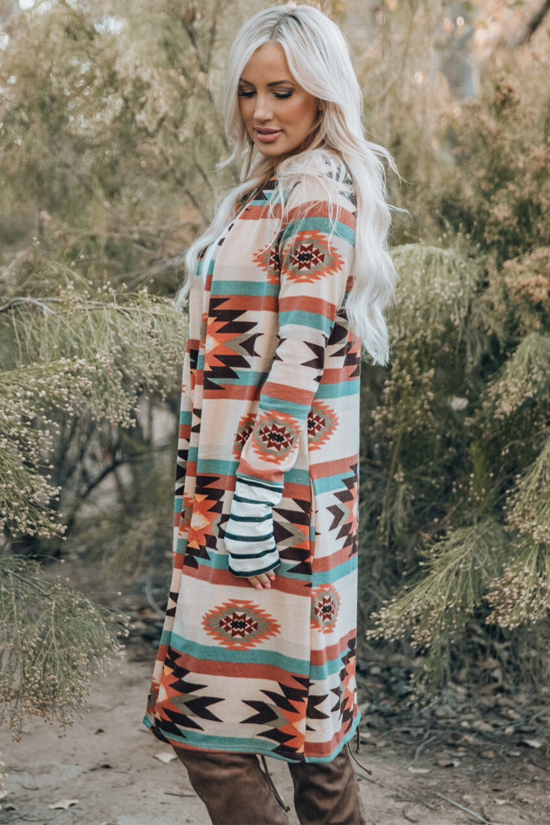 Southwestern print duster cardigan with stripe cuff sleeves and open front.