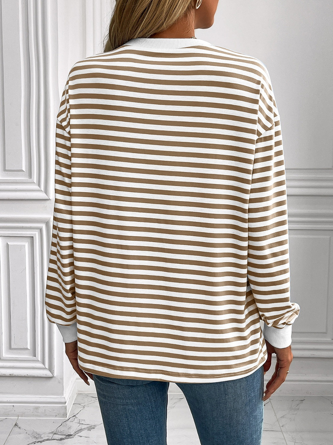 Horizontal stripe crewneck sweatshirt with cuffs in mocha and white, featuring ribbed cuffs and hem.