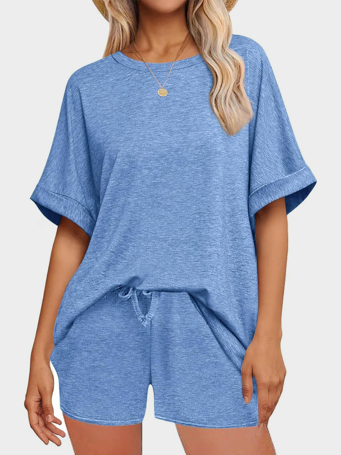 Blue relaxed fit tee and shorts loungewear set with crew neck and drawstring waist.
