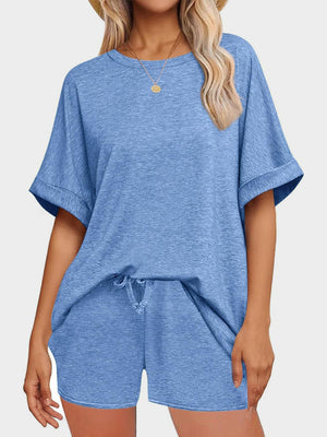 Blue relaxed fit tee and shorts loungewear set with crew neck and drawstring waist.