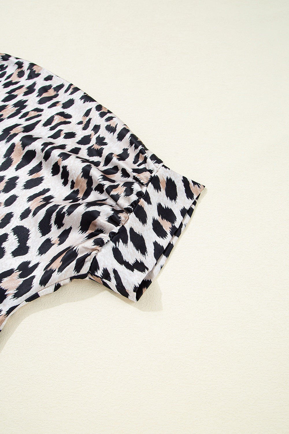 Leopard print oversized button-down blouse with ruched sleeve detail