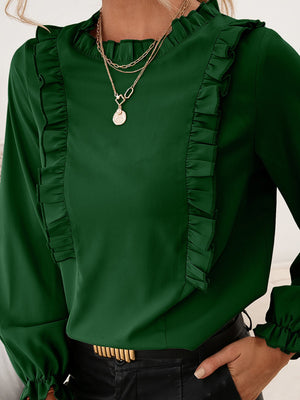 Dark green ruffled yoke blouson sleeve top with ruffled cuffs.