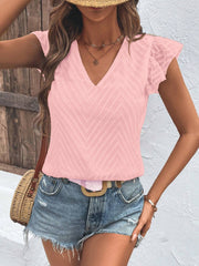 Blush pink textured chevron v-neck blouse with flutter sleeves