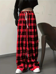 High waist wide leg pants in red and black plaid cotton with drawstring waist.