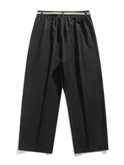 Black relaxed fit sweatpants with a belted waist and drawstring detail.