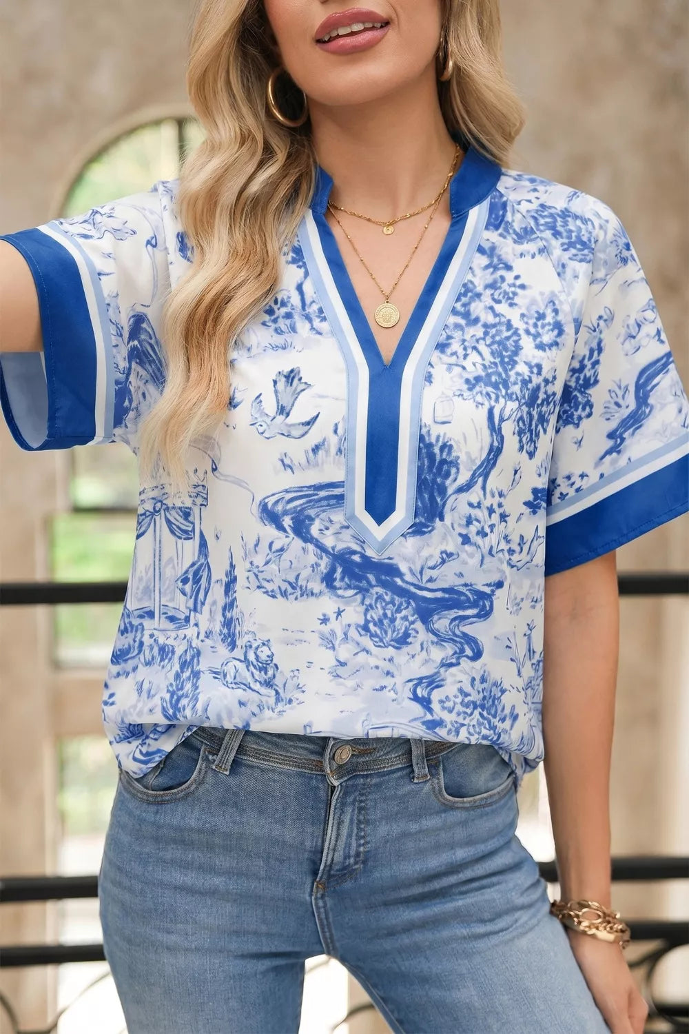 Women's blue and white toile print V-neck shirt, short sleeves, polyester