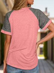 Raglan sleeve tee in pink with dark gray sleeves and crew neck.