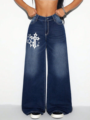 Dark wash cotton palazzo jeans with white cross and star graphic detail.