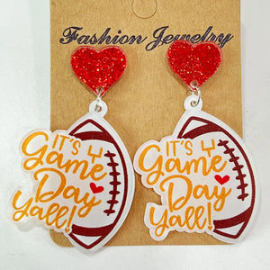 Game Day Acrylic Football Dangles with red glitter hearts and "It's Y'all" text.