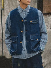 Plus-size navy denim vest with V-neck, button-up front, and four pockets.