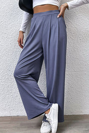 Wide-leg steel pleated front trousers with a comfortable, chic cut.