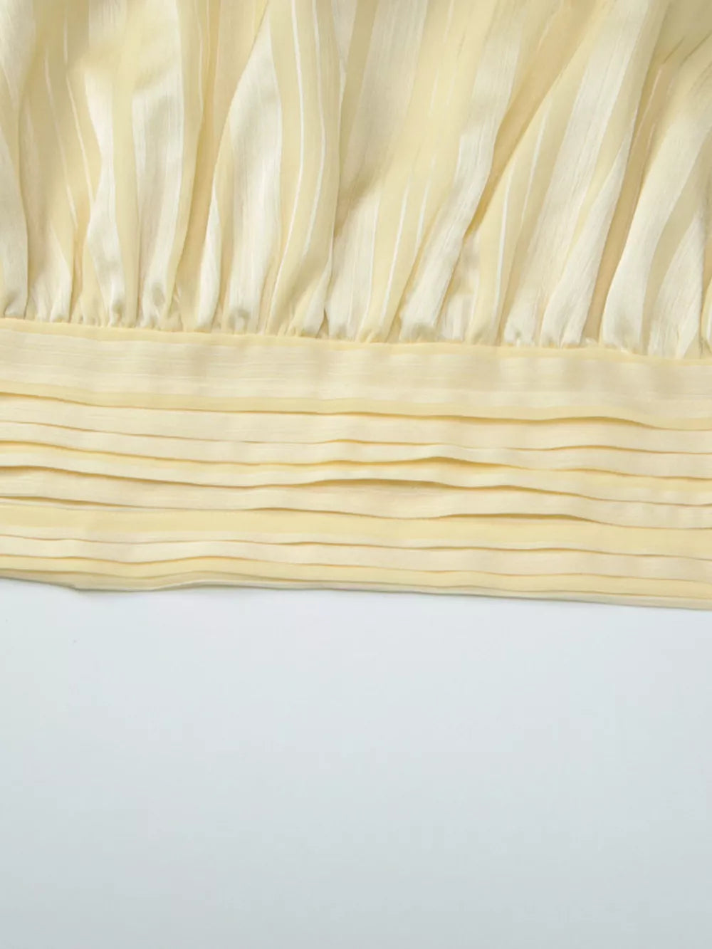 Yellow ruched halter cami top with vertical stripes and pleated detail
