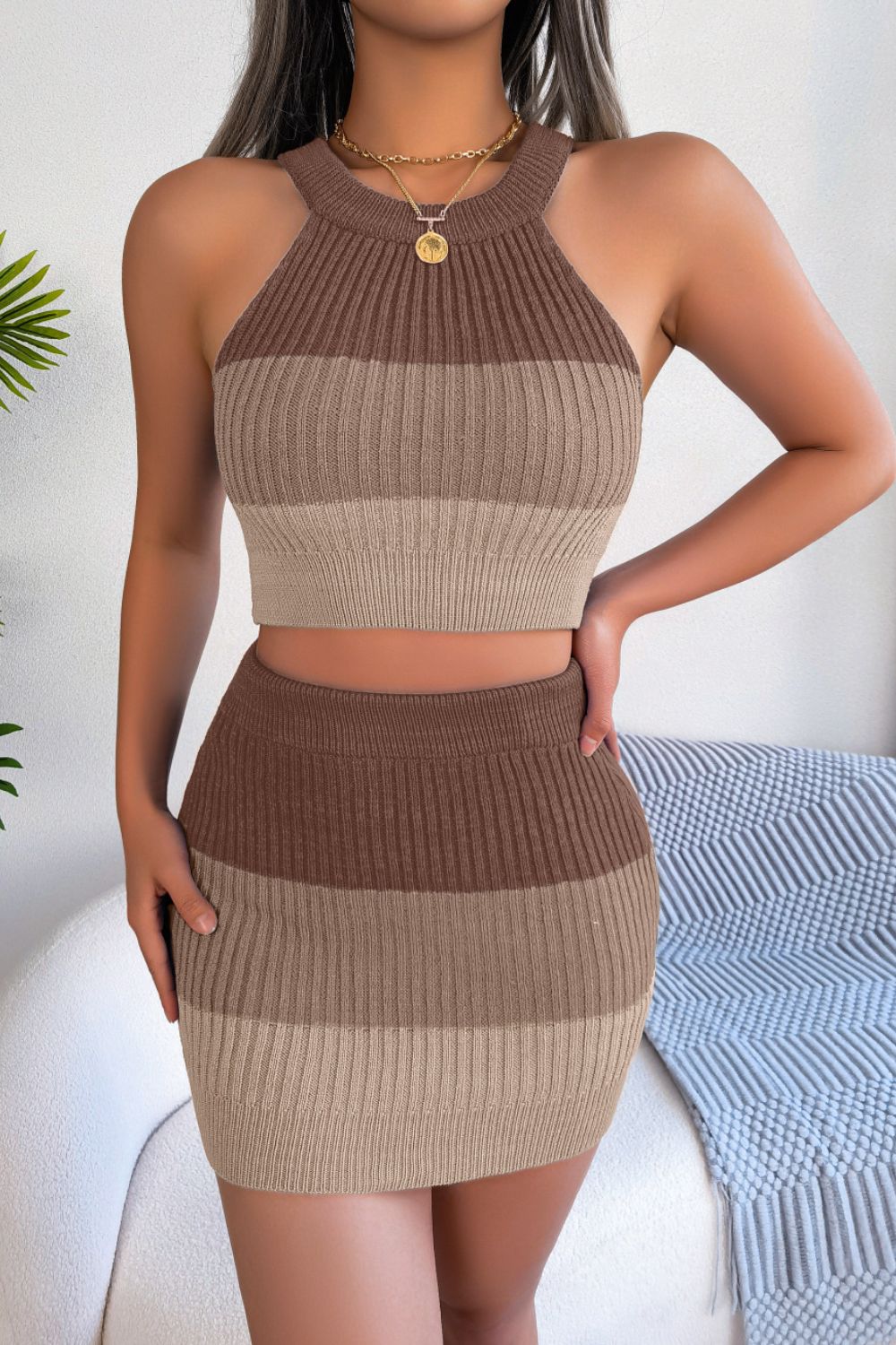 Ribbed halter crop top and mini skirt set in camel and brown colorblock.