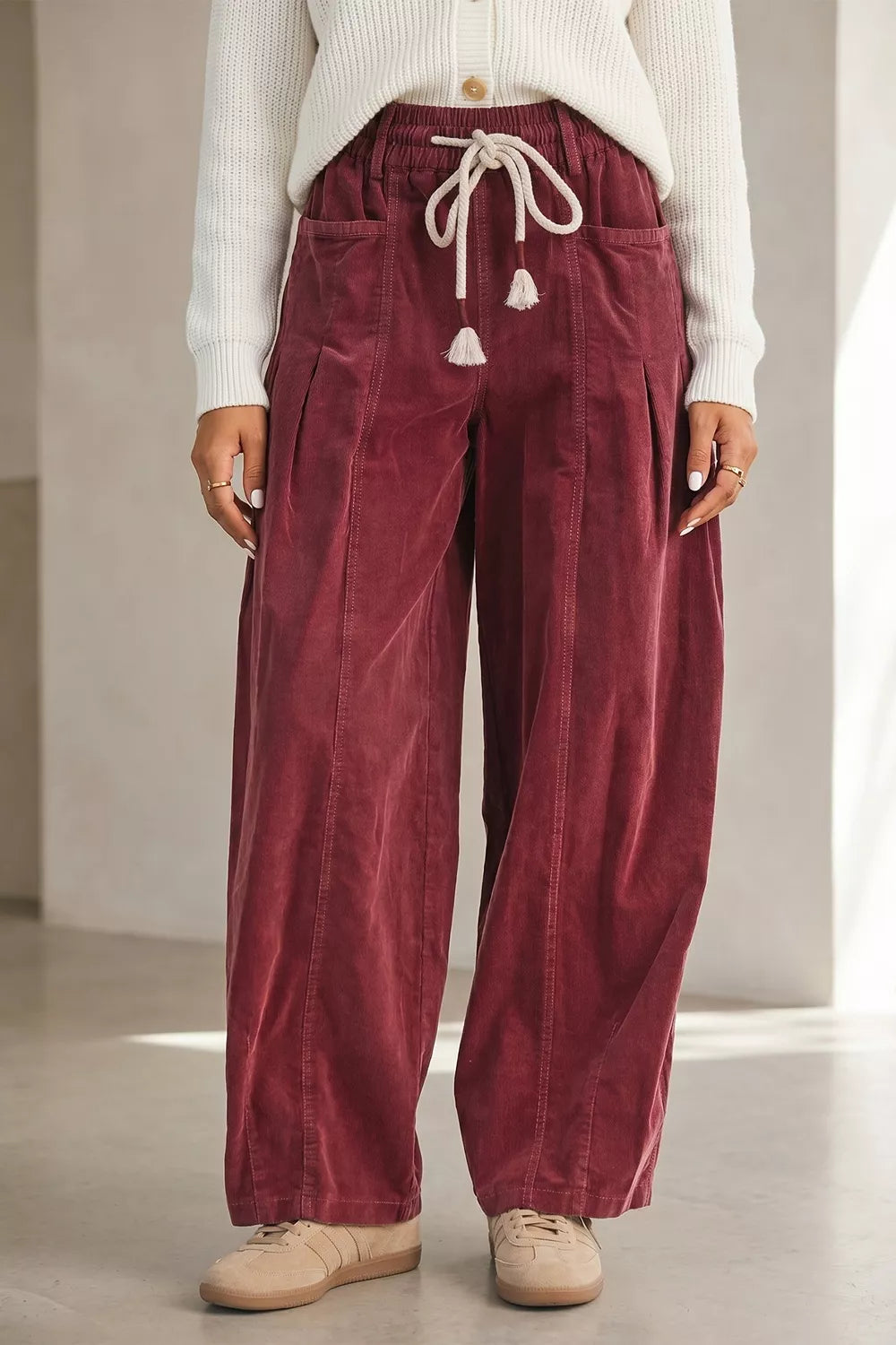 Elastic Waist Drawstring Corduroy Casual Pants in Burgundy, model styling view