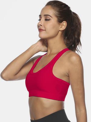 Racerback sports bra in deep red with a scoop neckline and pocket detail.