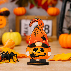 Halloween gnome figurine with pumpkin body, spiderweb hat, and spooky face.