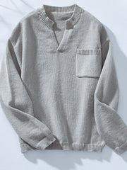 Gray knit sweater with notched neckline and chest pocket.
