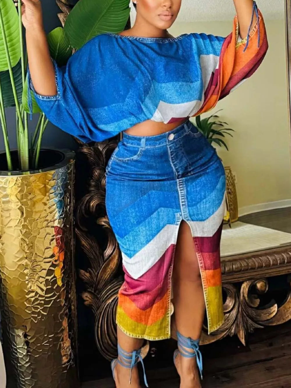Denim asymmetrical top and slit skirt set with colorful chevron print.