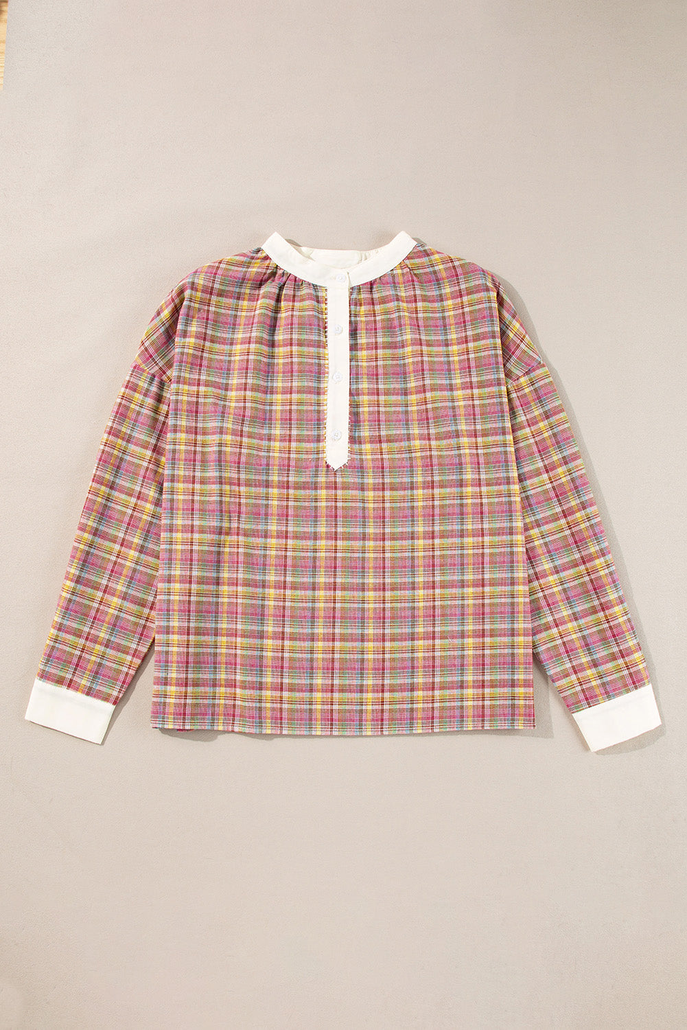 Bohemian plaid blouse with mandarin collar, buttoned placket, and white cuffs.