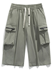 Army green cargo shorts with drawstring waist and zippered pockets.