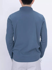 Men's Dusty Blue quarter-zip active t-shirt with long sleeves and a stand-up collar.