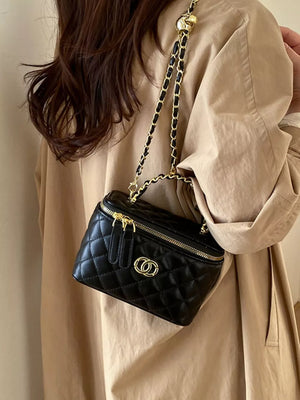 Quilted Leather Crossbody Bag in Black, close-up detail