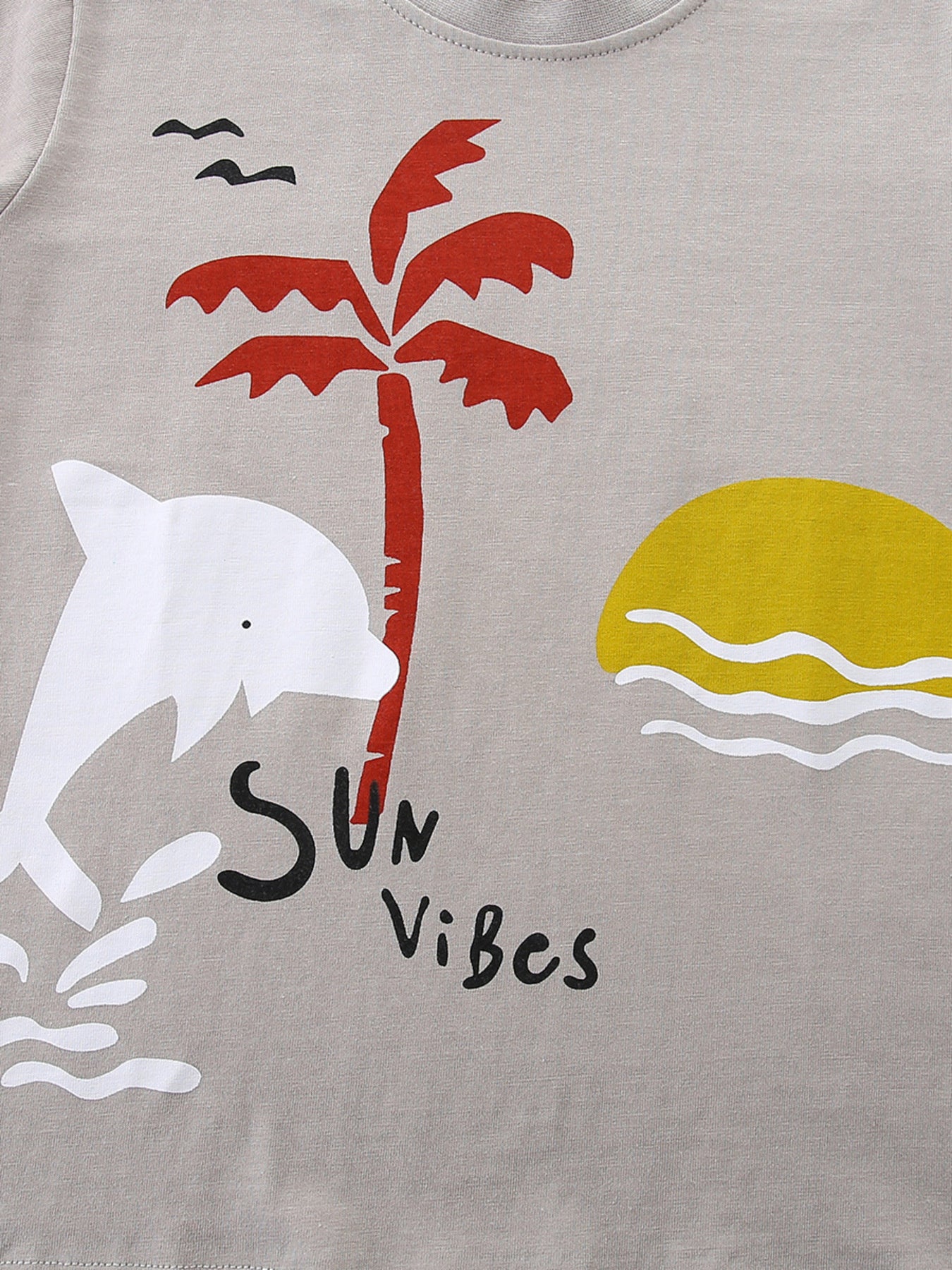 Kids graphic t-shirt in grey cotton with a dolphin, palm tree, sun, and "Sun Vibes" text.