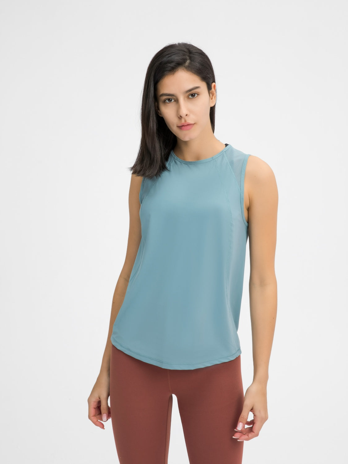 Mesh-back performance tank top in teal with a round neckline and sleeveless cut.